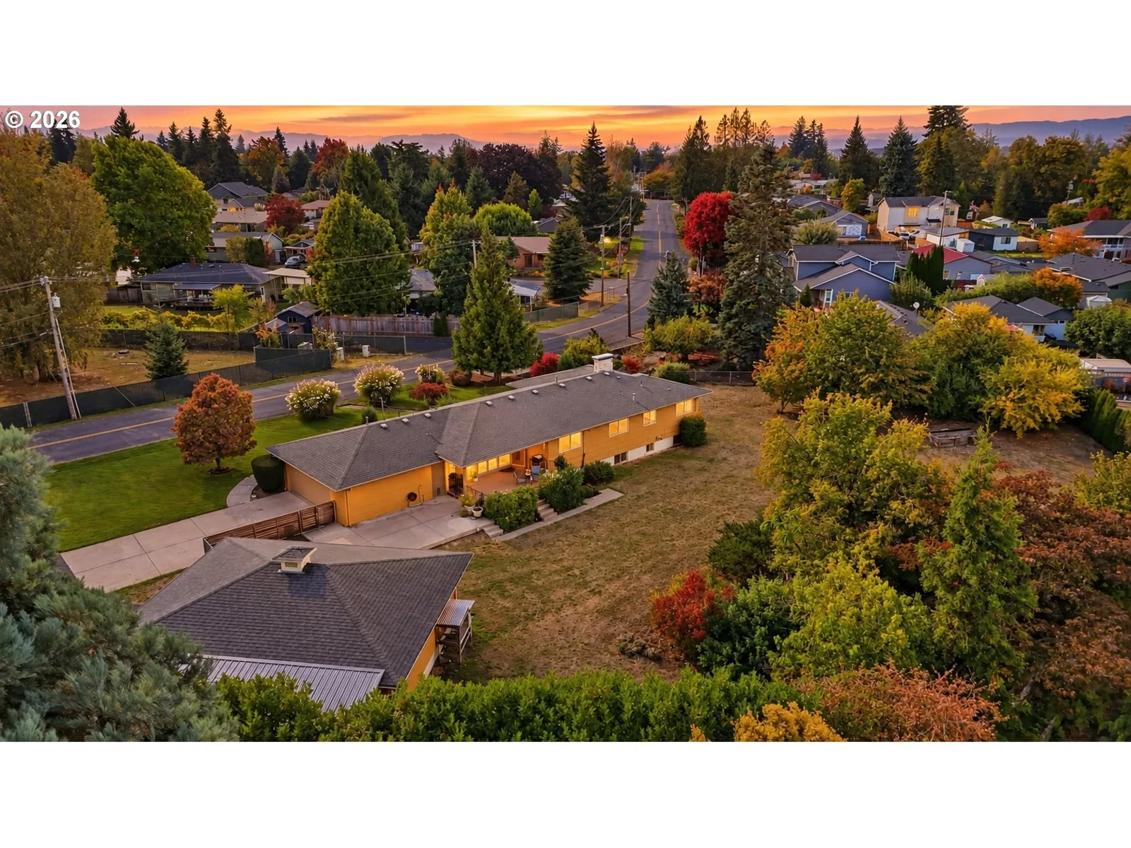 Aerial view of home and setting